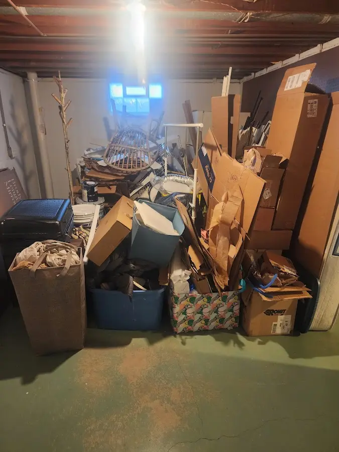 Roll-off dumpster container at job site for 2 Yard Dumpster Rental in Waikoloa Village